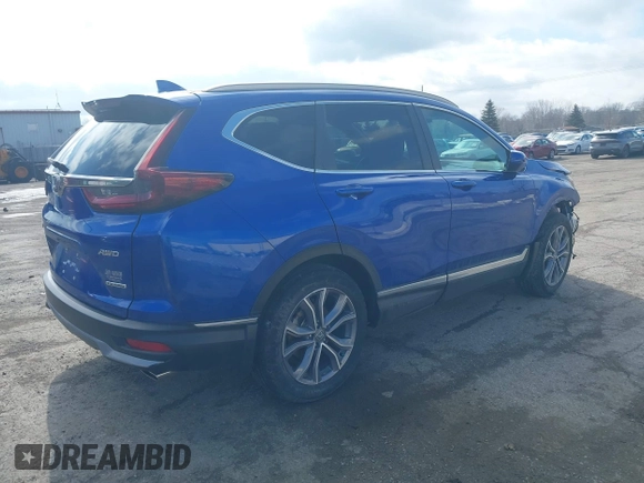 2020 Honda CR-V Touring with VIN 7FARW2H91LE012284, listed as a IAAI auction lot 41672460 with 28,207 mi miles and . Bid and sale history available at DreamBid. Image 4.