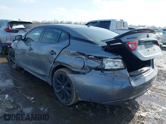 2018 Nissan Maxima SV with VIN 1N4AA6AP4JC372351, listed as a IAAI auction lot 41614526 with 70,237 mi miles and . Bid and sale history available at DreamBid. Image 3.