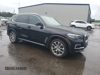 2022 BMW X5 xDrive40i with VIN 5UXCR6C06N9L83039, listed as a Copart auction lot 57109185 with 30,690 mi miles and Clean title. Bid and sale history available at DreamBid. Image 4.