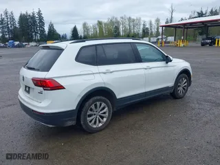 2018 Volkswagen Tiguan S with VIN 3VV0B7AXXJM051617, listed as a IAAI auction lot 41976860 with 66,186 mi miles. Bid and sale history available at carsss.com. Image 4.