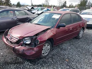 2003 Honda Civic LX with VIN 2HGES16553H558405, listed as a IAAI auction lot 41946031 with 127,145 mi miles. Bid and sale history available at carsss.com. Image 2.