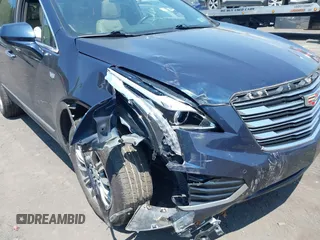 2017 Cadillac XT5 Luxury AWD with VIN 1GYKNDRSXHZ286737, listed as a IAAI auction lot 42428613 with 81,648 mi miles and . Bid and sale history available at DreamBid. Image 6.