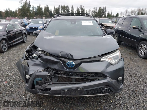 2018 Toyota RAV4 Hybrid SE with VIN JTMJJREV7JD208249, listed as a IAAI auction lot 41859301 with 91,899 mi miles and . Bid and sale history available at DreamBid. Image 12.