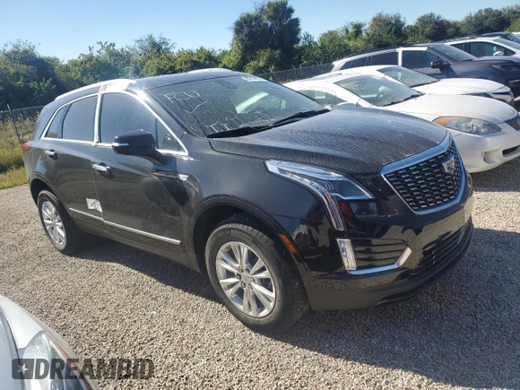 2022 Cadillac XT5 FWD Luxury z VIN 1GYKNAR47NZ100986, wystawiony jako Copart lot #83144574 z przebiegiem Nie podano mil oraz Nie do naprawy • Non repairable. Historia ofert i sprzedaży dostępna na DreamBid. Obrazek 4.