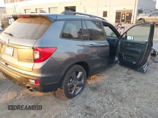 2020 Honda Passport Touring with VIN 5FNYF7H93LB006328, listed as a IAAI auction lot 41283115 with Not Provided miles and . Bid and sale history available at DreamBid. Image 4.