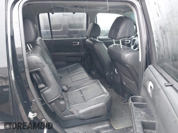 2014 Honda Pilot Touring with VIN 5FNYF4H91EB055741, listed as a IAAI auction lot 42006752 with 222,308 mi miles and . Bid and sale history available at carsss.com. Image 8.