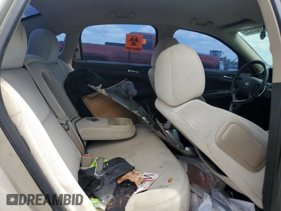 2012 Chevrolet Impala LT Retail with VIN 2G1WB5E32C1107055, listed as a Copart auction lot 53727135 with 219,249 mi miles and Salvage Title. Bid and sale history available at DreamBid. Image 10.