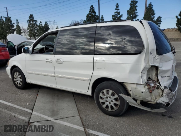 2005 Kia Sedona LX with VIN KNDUP132356623195, listed as a Copart auction lot 46623545 with 173,049 mi miles and Salvage Title. Bid and sale history available at carsss.com. Image 2.