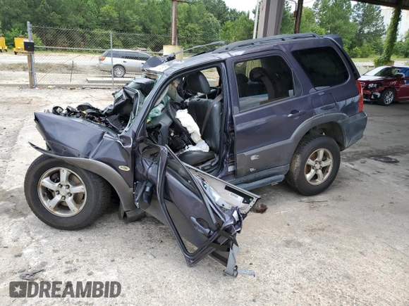 2005 Mazda Tribute S with VIN 4F2CZ06155KM32663, listed as a Copart auction lot 58622554 with 225,000 mi miles and Salvage Title. Bid and sale history available at DreamBid. Image 1.