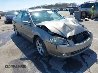 2005 Nissan Altima SE z VIN 1N4BL11D65C148642, wystawiony jako IAAI lot #42056330 z przebiegiem 81 328 mil mil oraz . Historia ofert i sprzedaży dostępna na DreamBid. Obrazek 1.