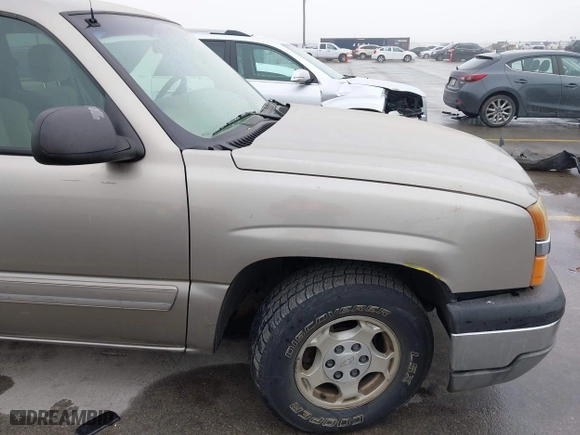 2003 Chevrolet Silverado 1500 LS with VIN 2GCEC19T131395606, listed as a IAAI auction lot 41969804 with 273,611 mi miles. Bid and sale history available at carsss.com. Image 6.