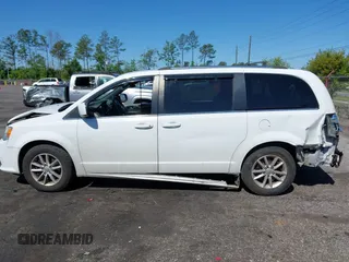2018 Dodge Grand Caravan SXT with VIN 2C4RDGCG1JR326457, listed as a IAAI auction lot 42047301 with 84,518 mi miles and . Bid and sale history available at DreamBid. Image 14.