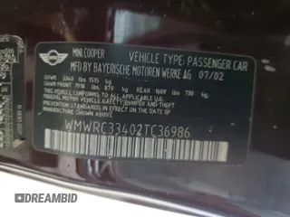 2002 MINI Hardtop with VIN WMWRC33402TC36986, listed as a Copart auction lot 50131045 with 194,224 mi miles and Salvage Title. Bid and sale history available at DreamBid. Image 12.