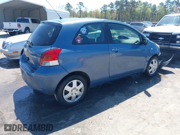 2010 Toyota Yaris with VIN JTDJT4K36A5285298, listed as a IAAI auction lot 42003609 with 158,418 mi miles. Bid and sale history available at carsss.com. Image 4.