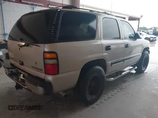 2004 Chevrolet Tahoe LS z VIN 1GNEC13Z34R191127, wystawiony jako IAAI lot #42304922 z przebiegiem 196 684 mil mil oraz . Historia ofert i sprzedaży dostępna na DreamBid. Obrazek 4.