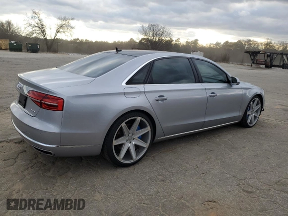 2016 Audi A8 3.0T with VIN WAU34AFD6GN010205, listed as a Copart auction lot 82362184 with 118,464 mi miles and Salvage Title. Bid and sale history available at DreamBid. Image 3.