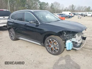 2021 BMW X1 xDrive28i with VIN WBXJG9C05M5T83784, listed as a IAAI auction lot 41696073 with 15,865 mi miles and . Bid and sale history available at DreamBid. Image 1.