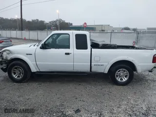 2002 Ford Ranger XL Fleet with VIN 1FTYR44U32PA59454, listed as a IAAI auction lot 41406926 with 241,534 mi miles. Bid and sale history available at carsss.com. Image 14.
