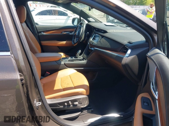 2020 Cadillac XT5 Premium Luxury FWD with VIN 1GYKNCRS0LZ220006, listed as a IAAI auction lot 41985265 with 47,464 mi miles and . Bid and sale history available at carsss.com. Image 5.