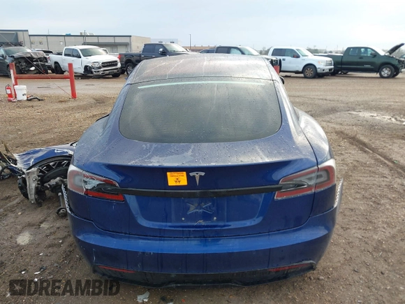 2021 Tesla Model S Long Range with VIN 5YJSA1E50MF432224, listed as a IAAI auction lot 41417130 with Not provided miles and . Bid and sale history available at DreamBid. Image 16.