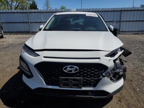 2021 Hyundai Kona SE z VIN KM8K1CAA7MU659637, wystawiony jako Copart lot #54394795 z przebiegiem 90 366 mil mil oraz Szkody całkowita. Historia ofert i sprzedaży dostępna na DreamBid. Obrazek 5.