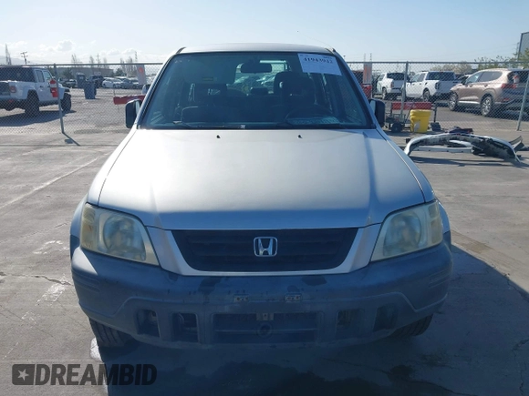 2001 Honda CR-V LX z VIN JHLRD28481S017409, wystawiony jako IAAI lot #41943942 z przebiegiem 134 999 mil mil oraz . Historia ofert i sprzedaży dostępna na DreamBid. Obrazek 12.