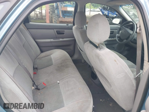 2006 Ford Taurus SE with VIN 1FAHP53226A245951, listed as a IAAI auction lot 42389703 with Not provided miles and . Bid and sale history available at DreamBid. Image 8.