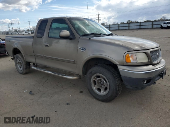 2001 Ford F-150 XL with VIN 1FTRX18L01KE64063, listed as a Copart auction lot 51500775 with 326,070 mi miles and Salvage title. Bid and sale history available at DreamBid. Image 4.