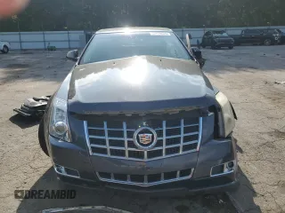 2013 Cadillac CTS Performance z VIN 1G6DK5E3XD0104466, wystawiony jako Copart lot #57479555 z przebiegiem Nie podano mil oraz Szkody całkowita. Historia ofert i sprzedaży dostępna na DreamBid. Obrazek 5.