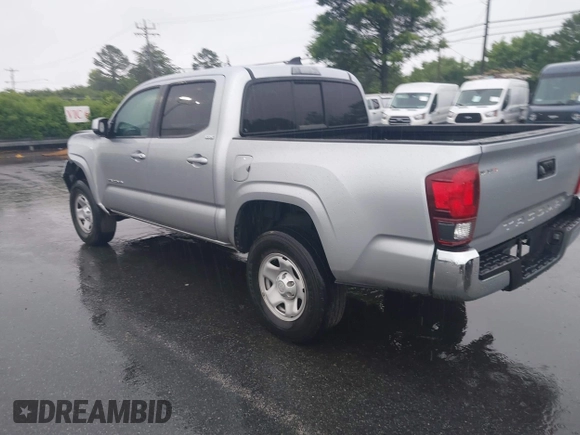 2023 Toyota Tacoma SR with VIN 3TYAX5GN0PT071080, listed as a IAAI auction lot 42426897 with 58,017 mi miles and . Bid and sale history available at DreamBid. Image 3.