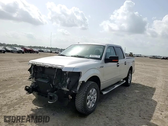 2014 Ford F-150 XL with VIN 1FTFW1ET0EKG04449, listed as a Copart auction lot 62642725 with 223,472 mi miles and Salvage title. Bid and sale history available at DreamBid. Image 14.