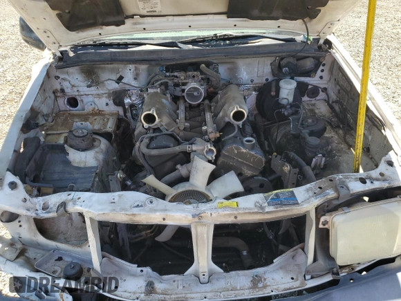2003 Chevrolet Tracker ZR2 z VIN 2CNBJ734236932592, wystawiony jako Copart lot #58171145 z przebiegiem Nie podano mil oraz Szkoda całkowita • Salvage title. Historia ofert i sprzedaży dostępna na DreamBid. Obrazek 12.
