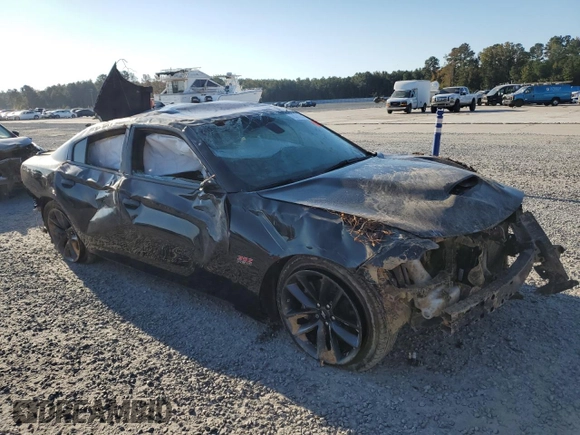 2019 Dodge Charger Scat Pack with VIN 2C3CDXGJ2KH697179, listed as a Copart auction lot 77311144 with 81,789 mi miles and Salvage Title. Bid and sale history available at DreamBid. Image 4.