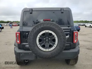 2023 Ford Bronco with VIN 1FMDE5DH0PLB09207, listed as a Copart auction lot 51827984 with 19,766 mi miles and Salvage Title. Bid and sale history available at carsss.com. Image 6.