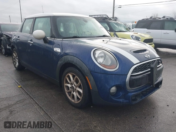 2015 MINI Hardtop 4 Door S with VIN WMWXU3C58FT892238, listed as a IAAI auction lot 41104432 with 156,722 mi miles and . Bid and sale history available at DreamBid. Image 1.