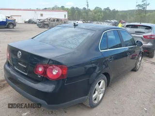 2008 Volkswagen Jetta Sedan SE with VIN 3VWRM71K18M052182, listed as a IAAI auction lot 41964674 with 218,202 mi miles. Bid and sale history available at carsss.com. Image 4.