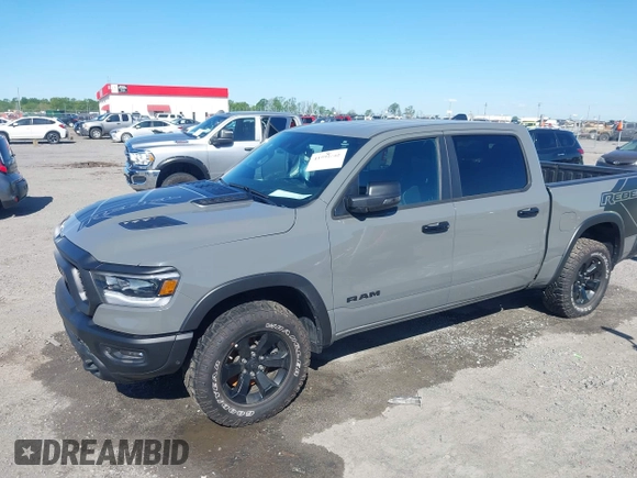2023 Ram 1500 Rebel with VIN 1C6SRFLT2PN677577, listed as a IAAI auction lot 41991668 with 20,507 mi miles and . Bid and sale history available at DreamBid. Image 6.