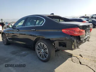 2018 BMW 5 Series 530i with VIN WBAJA5C52JWA36440, listed as a Copart auction lot 63325515 with 8,786 mi miles and Salvage title. Bid and sale history available at DreamBid. Image 2.