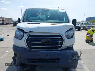 2020 Ford Transit Cargo with VIN 1FTBR1Y80LKA67205, listed as a IAAI auction lot 41805459 with 184,186 mi miles and . Bid and sale history available at DreamBid. Image 11.