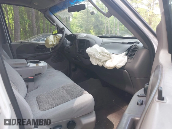 2003 Ford F-150 XLT with VIN 1FTRW07663KD69809, listed as a IAAI auction lot 42198549 with 166,466 mi miles and . Bid and sale history available at DreamBid. Image 5.