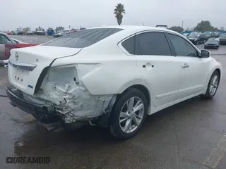 2014 Nissan Altima 2.5 SV with VIN 1N4AL3AP3EC319882, listed as a IAAI auction lot 41563324 with 108,121 mi miles. Bid and sale history available at carsss.com. Image 4.