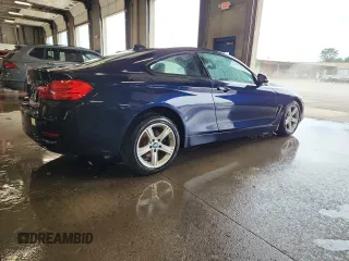 2015 BMW 4 Series 428i xDrive with VIN WBA3N5C59FK198767, listed as a Copart auction lot 64498675 with 99,271 mi miles and Clean title. Bid and sale history available at DreamBid. Image 3.