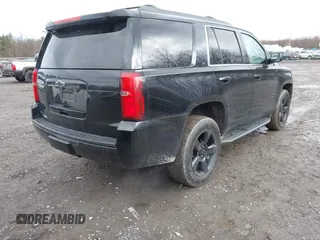 2018 Chevrolet Tahoe LT z VIN 1GNSKBKC7JR276427, wystawiony jako IAAI lot #41977418 z przebiegiem 152 007 mil mil oraz . Historia ofert i sprzedaży dostępna na DreamBid. Obrazek 4.