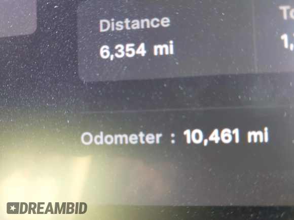 2023 Tesla Model Y Long Range z VIN 7SAYGDEE5PF765326, wystawiony jako IAAI lot #41757113 z przebiegiem 10 461 mil mil oraz . Historia ofert i sprzedaży dostępna na DreamBid. Obrazek 16.