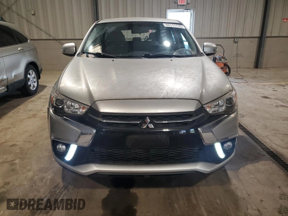 2018 Mitsubishi Outlander SE z VIN JA4AR3AW7JU001634, wystawiony jako Copart lot #60111115 z przebiegiem 44 679 mil mil oraz Szkoda całkowita • Salvage title. Historia ofert i sprzedaży dostępna na DreamBid. Obrazek 5.