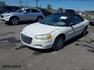 2006 Chrysler Sebring Conv Touring with VIN 1C3EL55R86N135731, listed as a IAAI auction lot 41693953 with 170,628 mi miles. Bid and sale history available at carsss.com. Image 2.