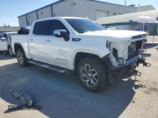 2023 GMC Sierra 1500 SLT z VIN 3GTUUDE83PG267733, wystawiony jako Copart lot #61530004 z przebiegiem 21 446 mil mil oraz Szkoda całkowita • Salvage title. Historia ofert i sprzedaży dostępna na DreamBid. Obrazek 4.