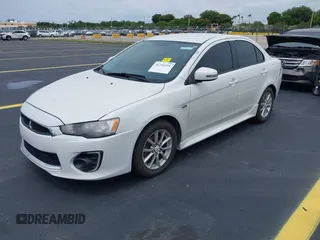 2016 Mitsubishi Lancer ES z VIN JA32U2FU7GU000923, wystawiony jako IAAI lot #42238951 z przebiegiem 134 955 mil mil oraz . Historia ofert i sprzedaży dostępna na DreamBid. Obrazek 2.