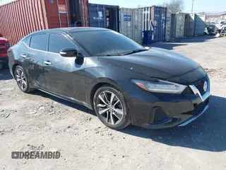 2019 Nissan Maxima Platinum z VIN 1N4AA6AV0KC365901, wystawiony jako IAAI lot #41473793 z przebiegiem 137 772 mil mil oraz . Historia ofert i sprzedaży dostępna na DreamBid. Obrazek 1.