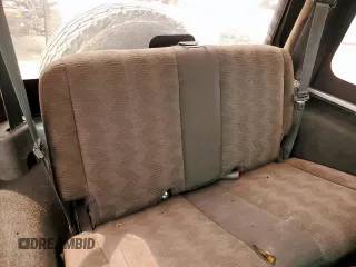 2004 Jeep Wrangler X z VIN 1J4FA39S34P702186, wystawiony jako Copart lot #59561675 z przebiegiem 202 214 mil mil oraz Szkoda całkowita • Salvage title. Historia ofert i sprzedaży dostępna na DreamBid. Obrazek 11.